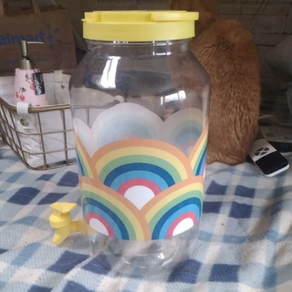 Colorful Rainbow Beverage Dispenser with Yellow Lid